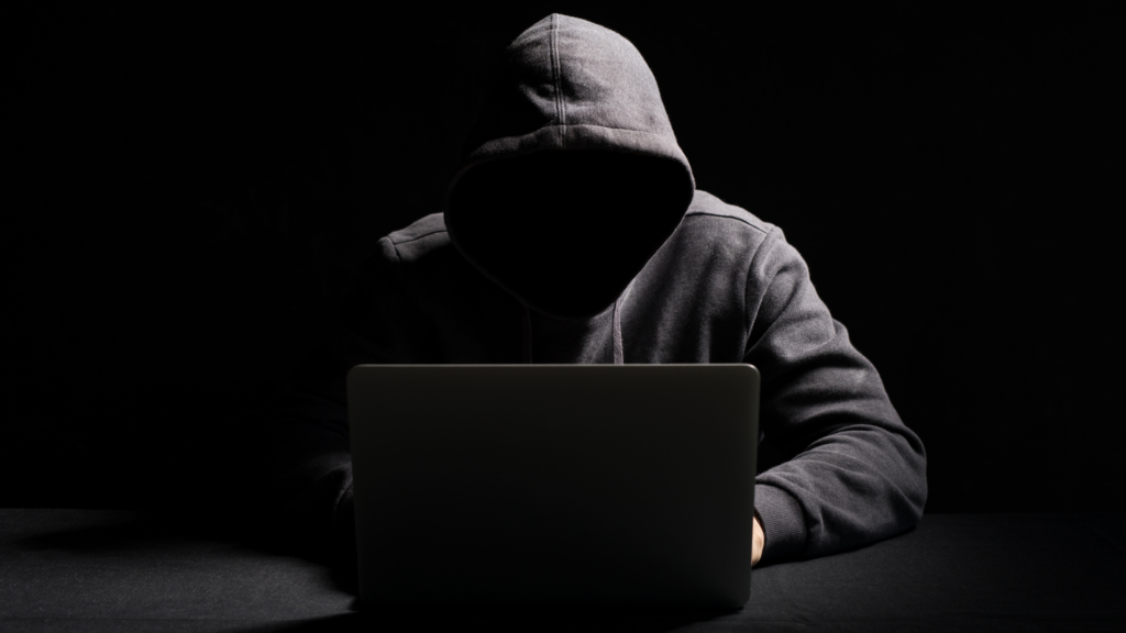 Hacker in front of a laptop