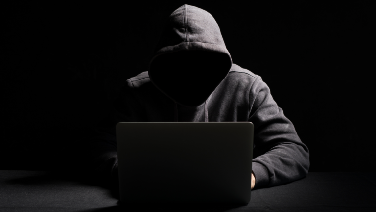 Hacker in front of a laptop